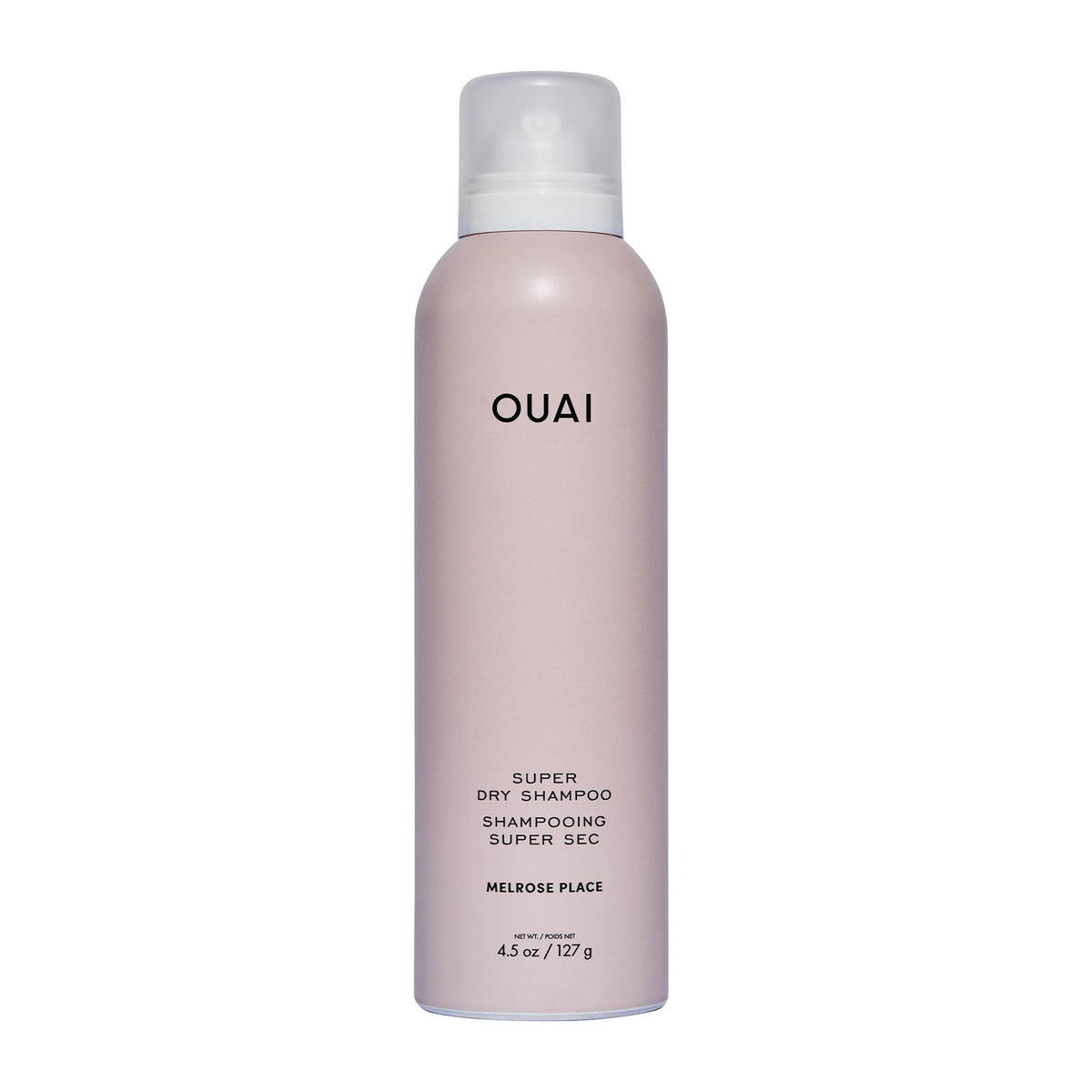 OUAI Super Dry Shampoo bottle demonstrates oil-absorbing formula for quick refresh.