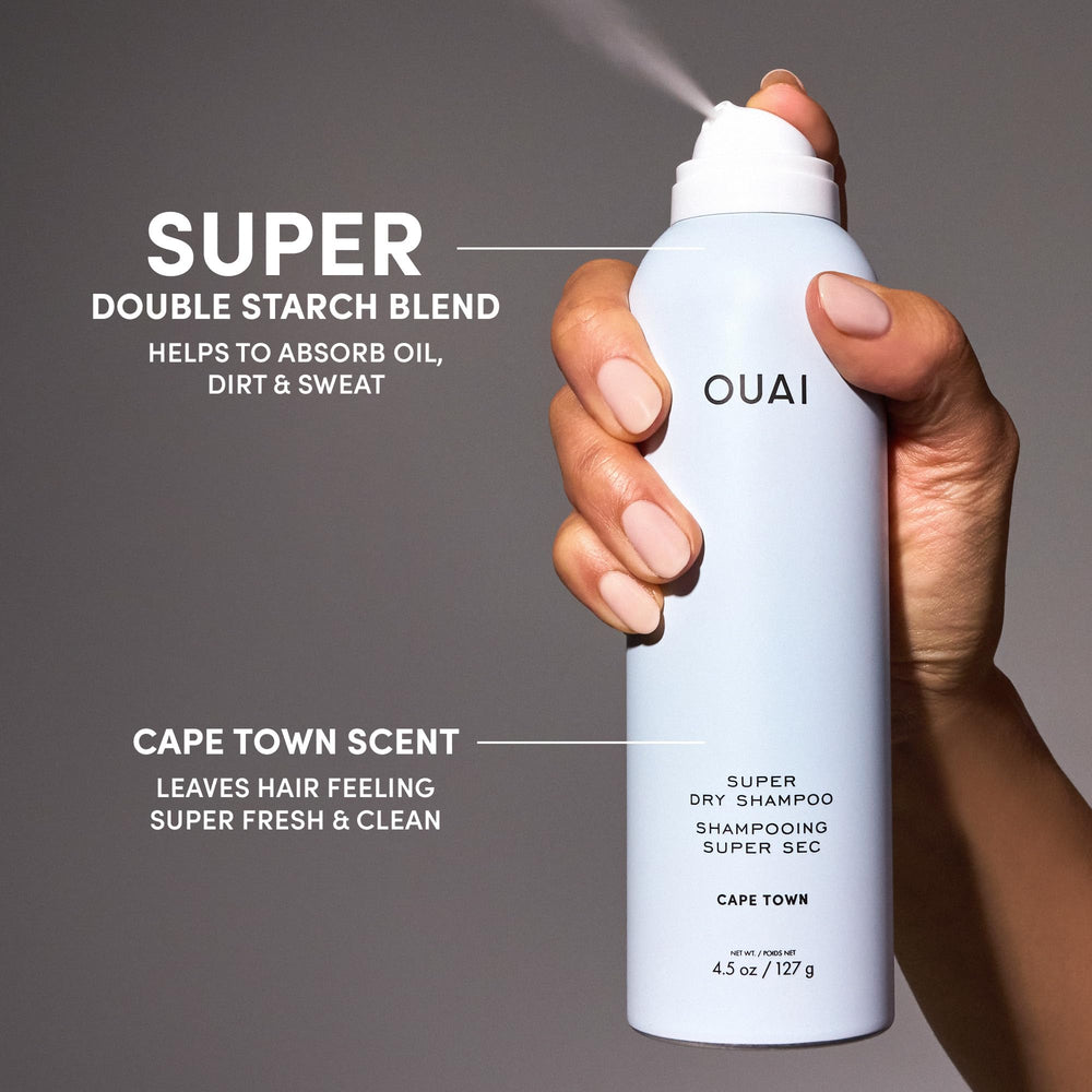 OUAI Super Dry Shampoo close-up shows spray action and Cape Town aroma.