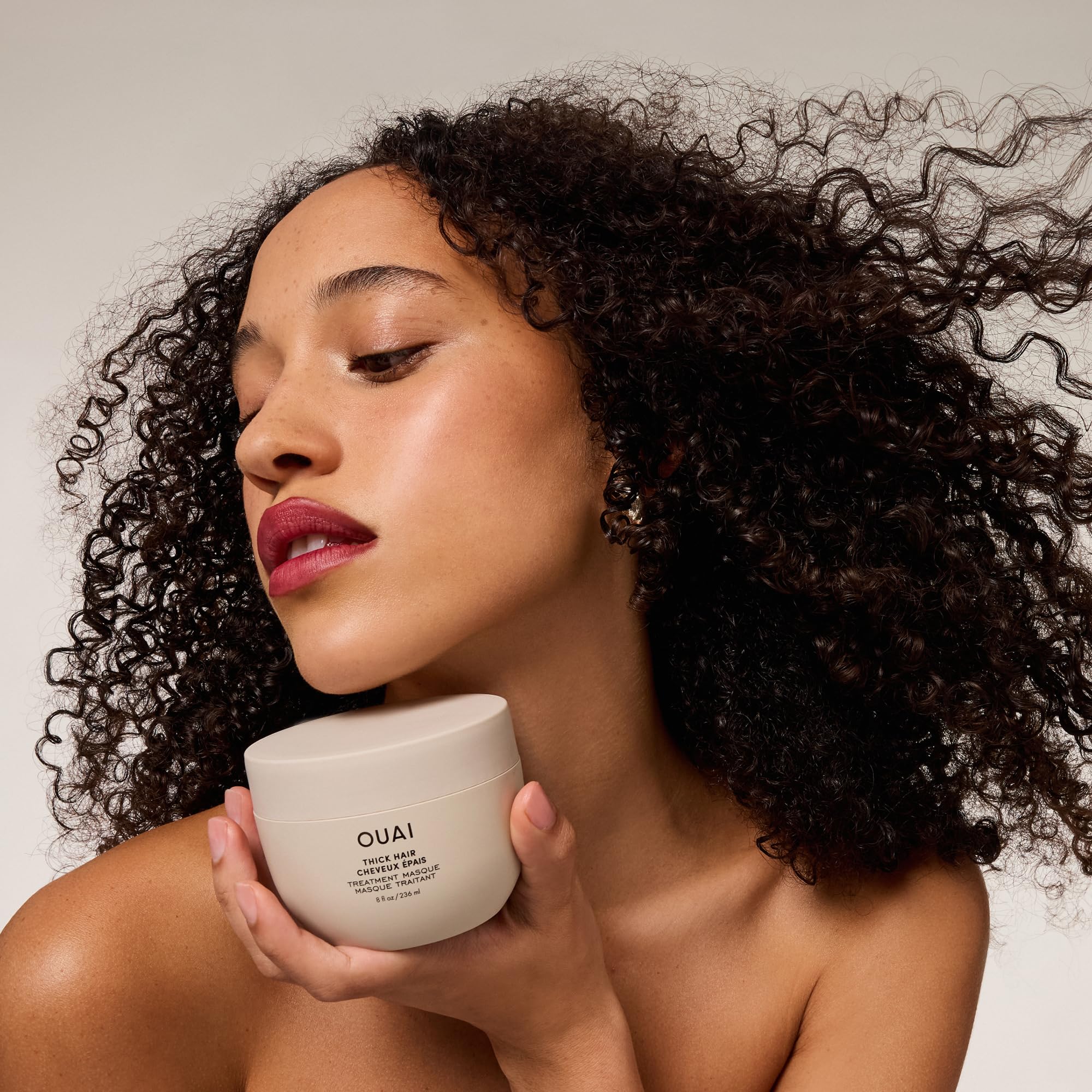 OUAI Thick Hair Mask frizz control for smoother styles.