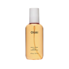 OUAI Wave Spray bottle close-up showing texture and shine for hair styling