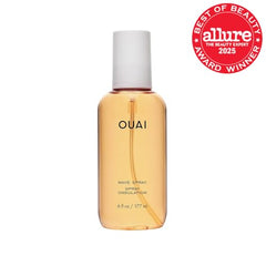 OUAI Wave Spray being misted on damp hair to create beachy texture