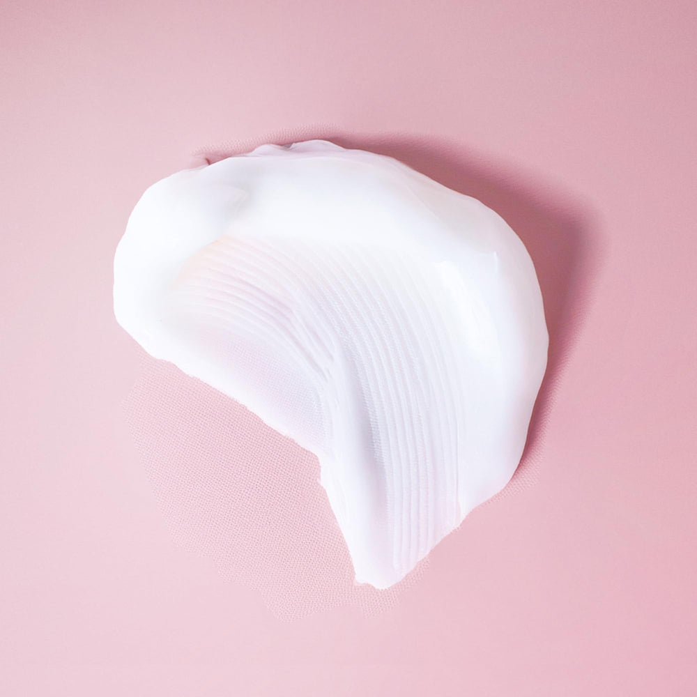 Ouidad Advanced Climate Control cruelty-free symbol—ethical choice for color-treated curls.