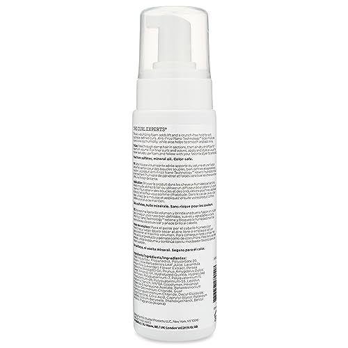 Ouidad advanced climate control foam applied on hair, delivering curl definition without weight.
