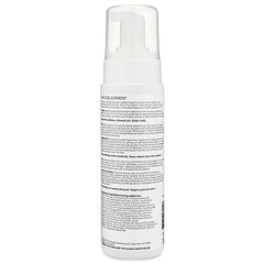 Ouidad advanced climate control foam applied on hair, delivering curl definition without weight.