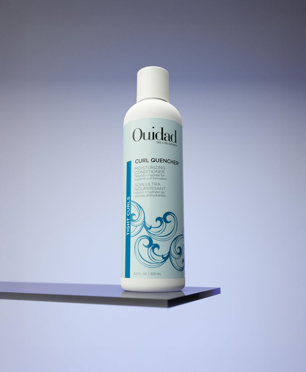 Ouidad Curl Quencher texture close-up shows creamy conditioner for detangling