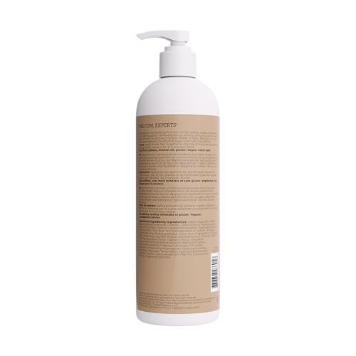 Ouidad Curl Shaper bottle during application as a co-wash