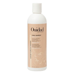 Ouidad Curl Shaper Good As New shampoo bottle, gentle cleanse for soft, defined curls.