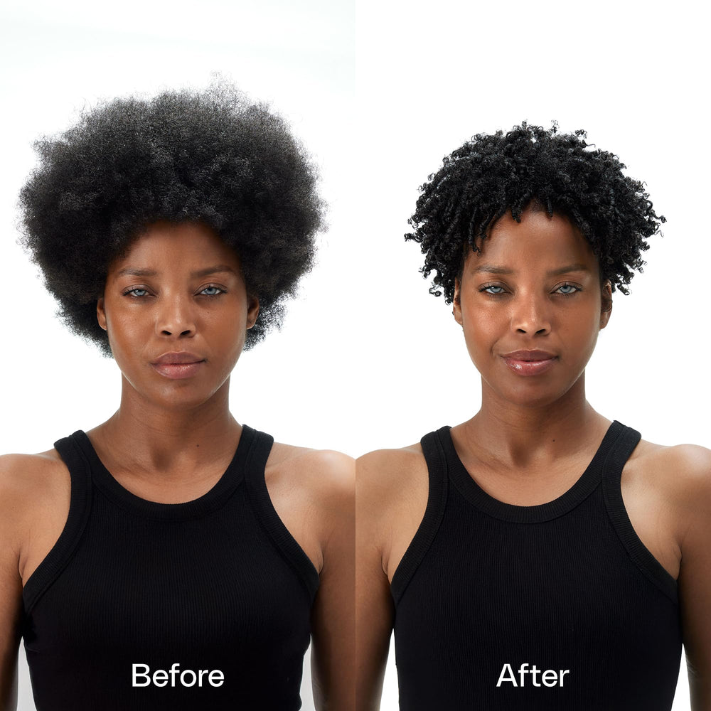 Ouidad leave-in conditioner in hand providing detangling slip for curls.