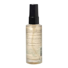 Ouidad Mongongo Oil texture close-up showing lightweight hydration for curls.