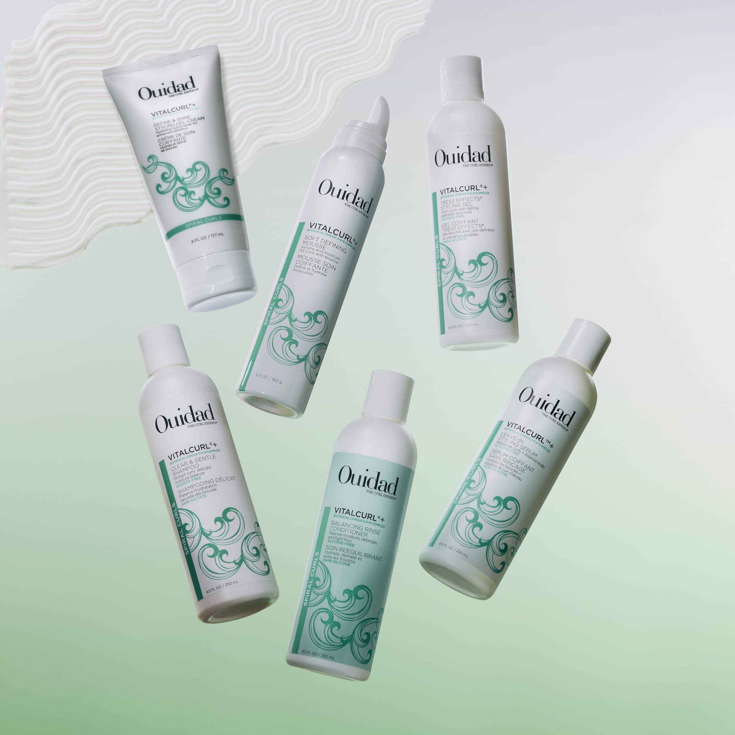 Ouidad VitalCurl+ apto para color mostrado en envase cuida rizos teñidos.