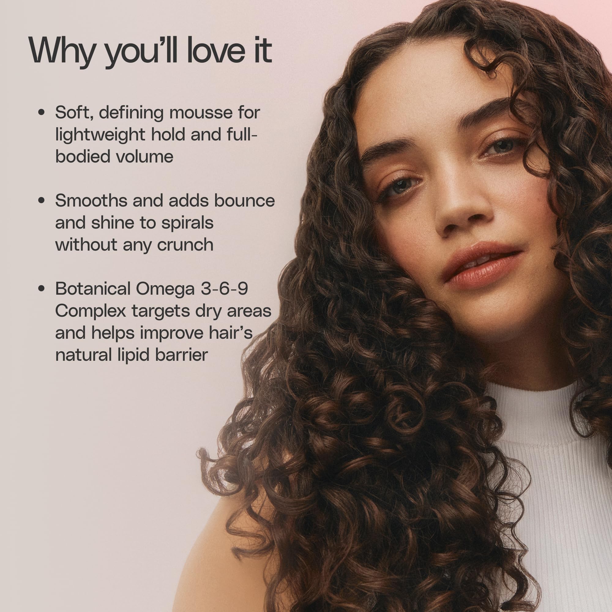 Ouidad VitalCurl+ Mousse-defined spirals with shine and movement.