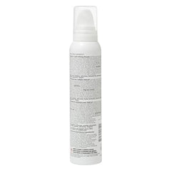 Ouidad VitalCurl+ Mousse foam texture highlights curl-defining formula.