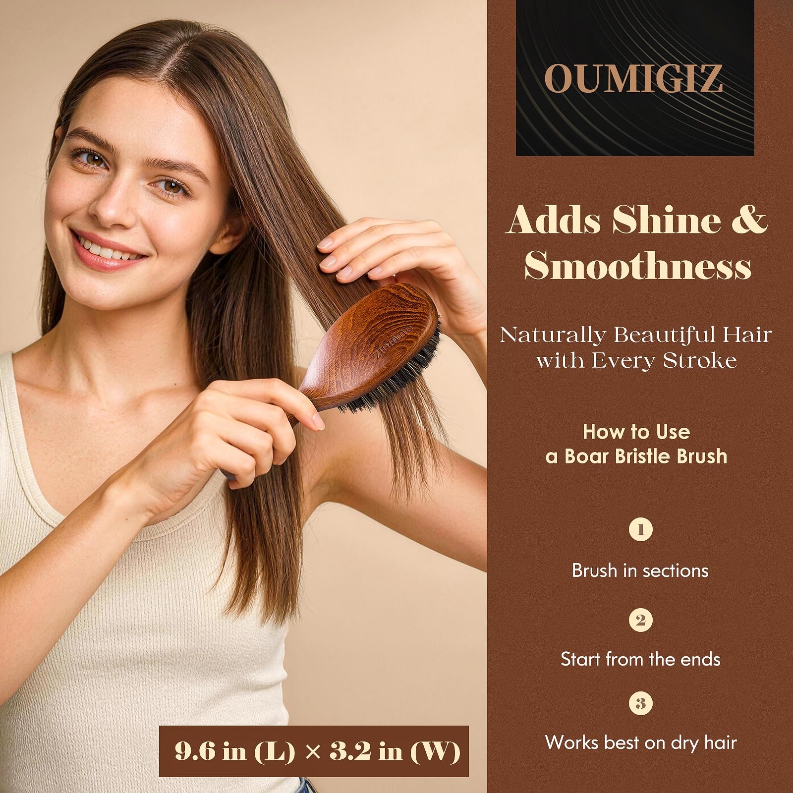 OUMIGIZ boar bristle brush detangling action in use for smoother hair.