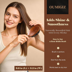 OUMIGIZ boar bristle brush detangling action in use for smoother hair.