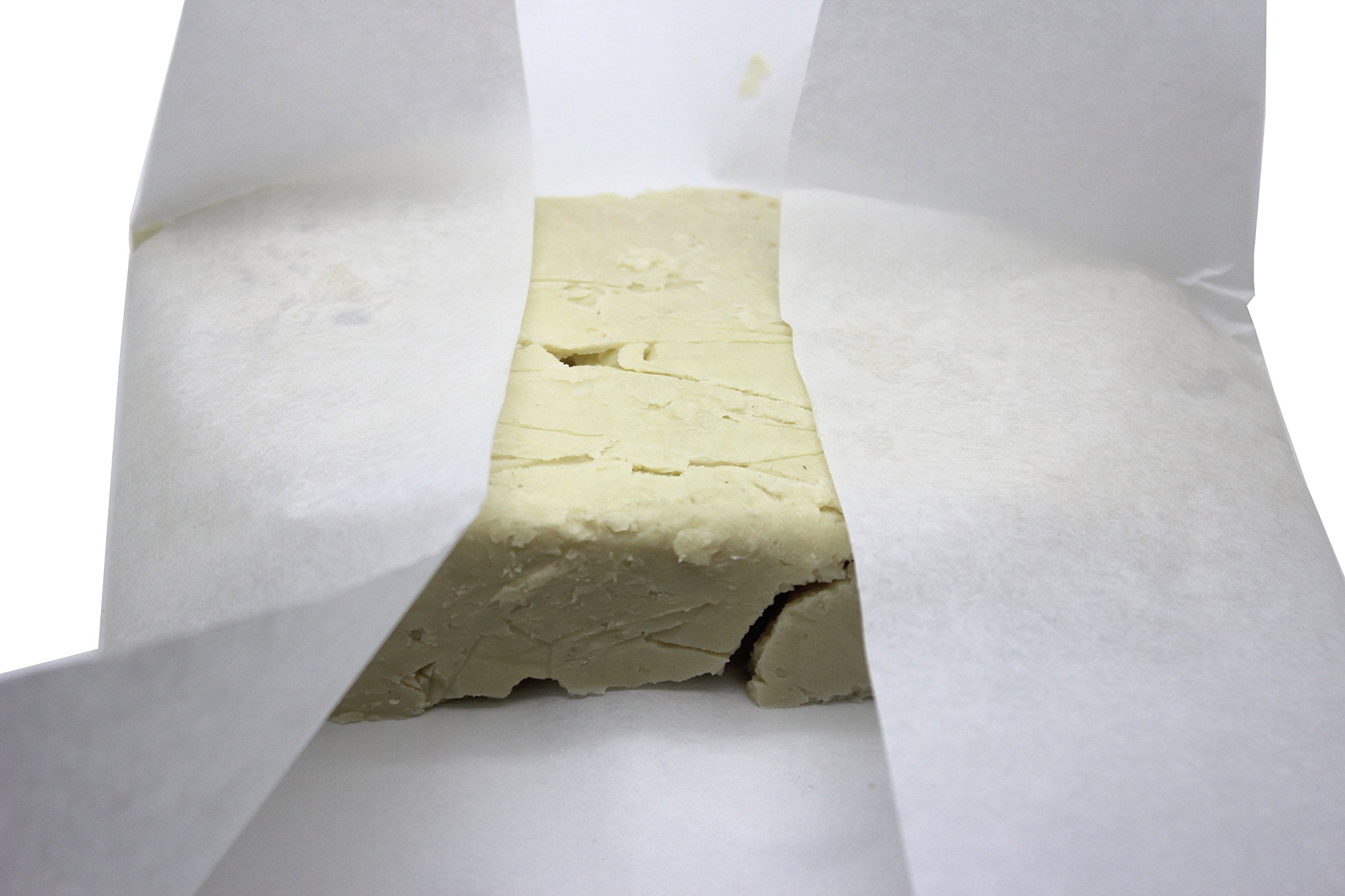 Our Earth's Secrets Manteca Karité Ivory aroma nuez, perfecto para un ritual de cuidado suave.
