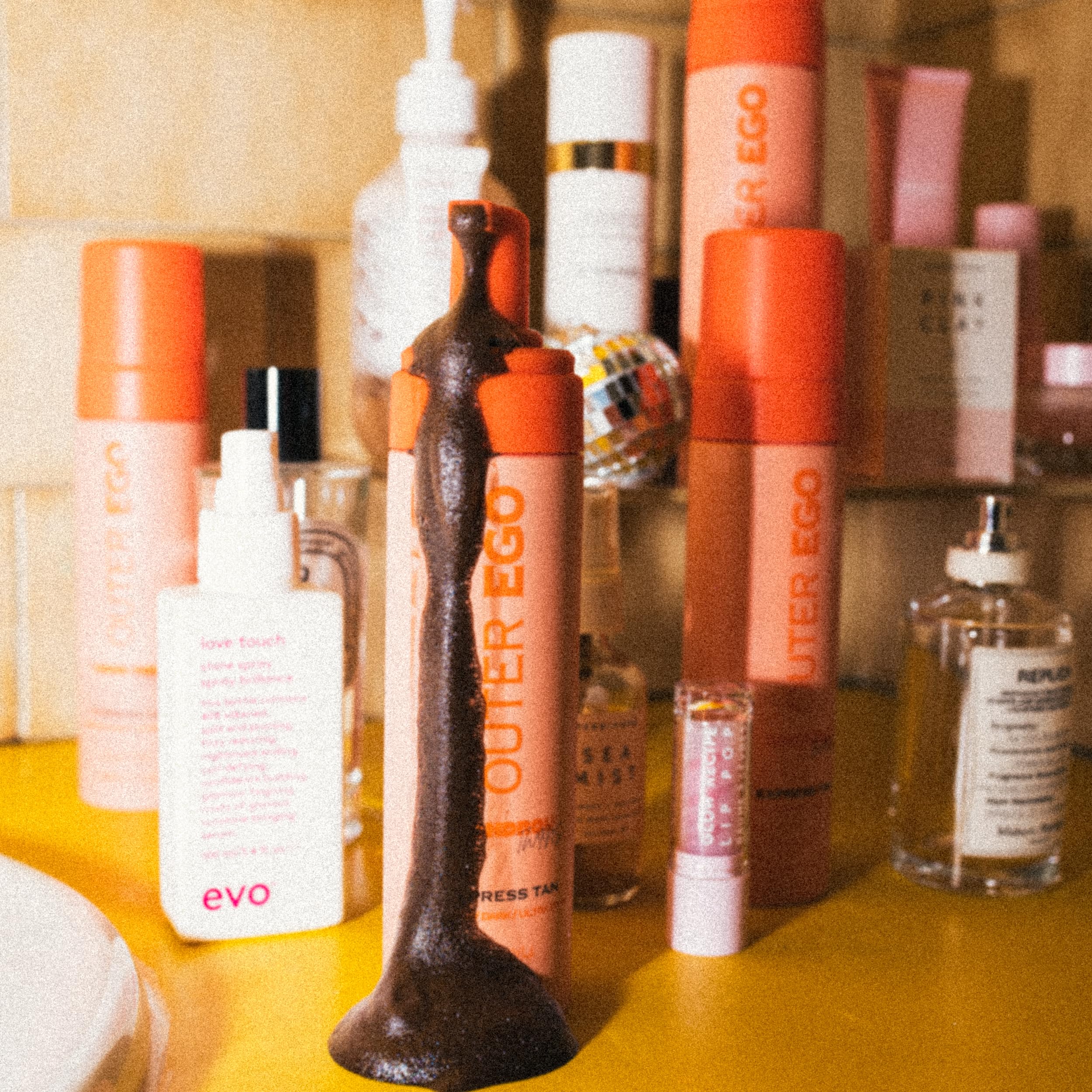 Outer Ego Express Tan Mousse on skin delivers gradual color with customizable timing options