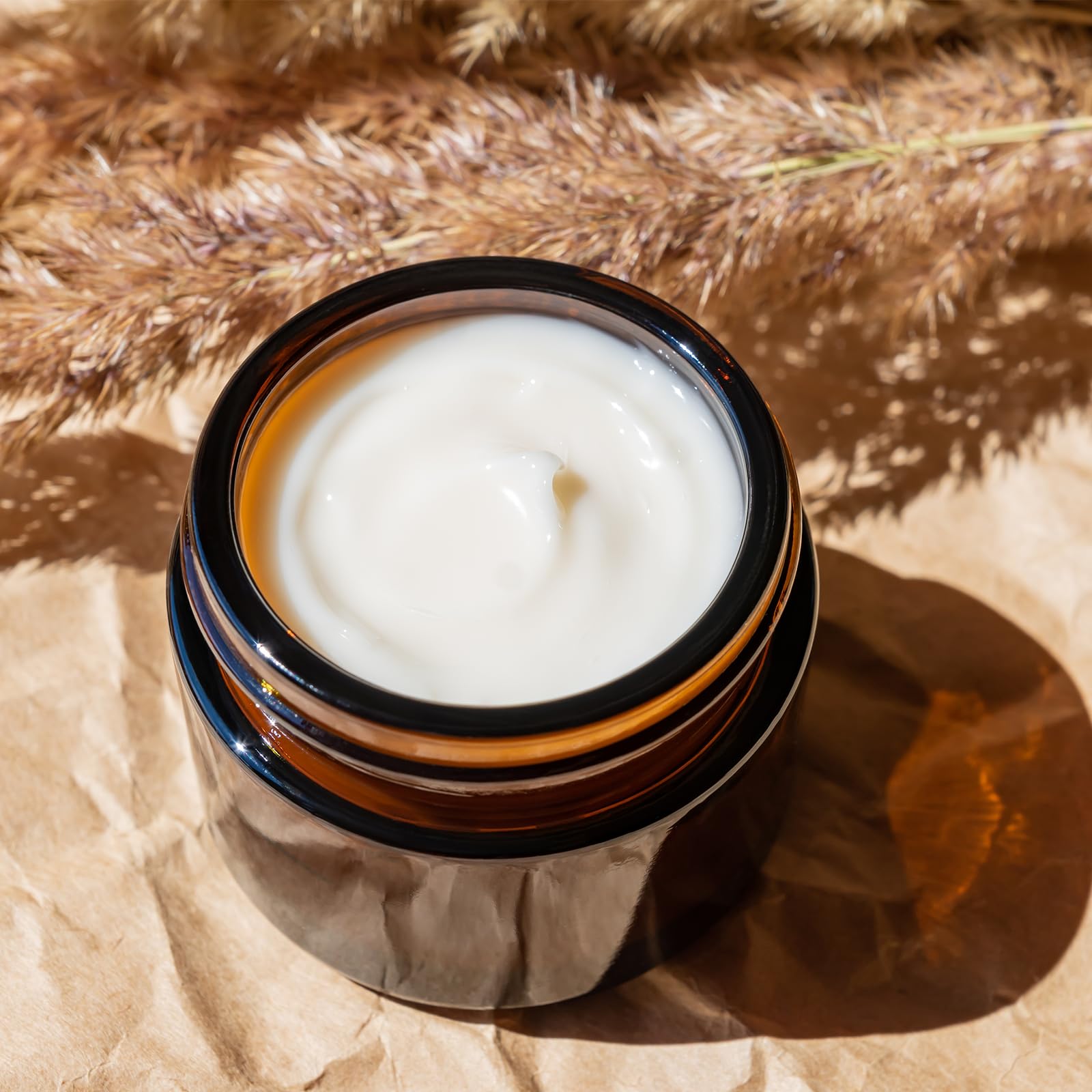 Over News amber glass jar showing a leak-proof lid for secure storage.
