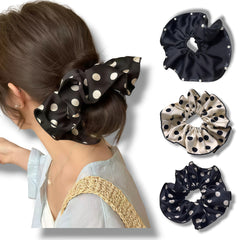 Glossy satin scrunchies glide through hair, reducing snagging and pulling.