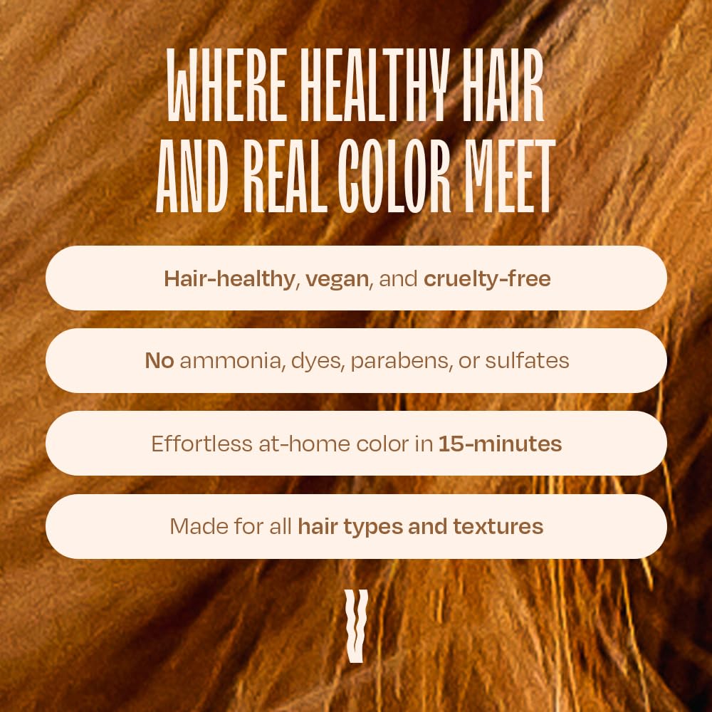 bottle highlight of coconut, jojoba, and shea oils in the formula