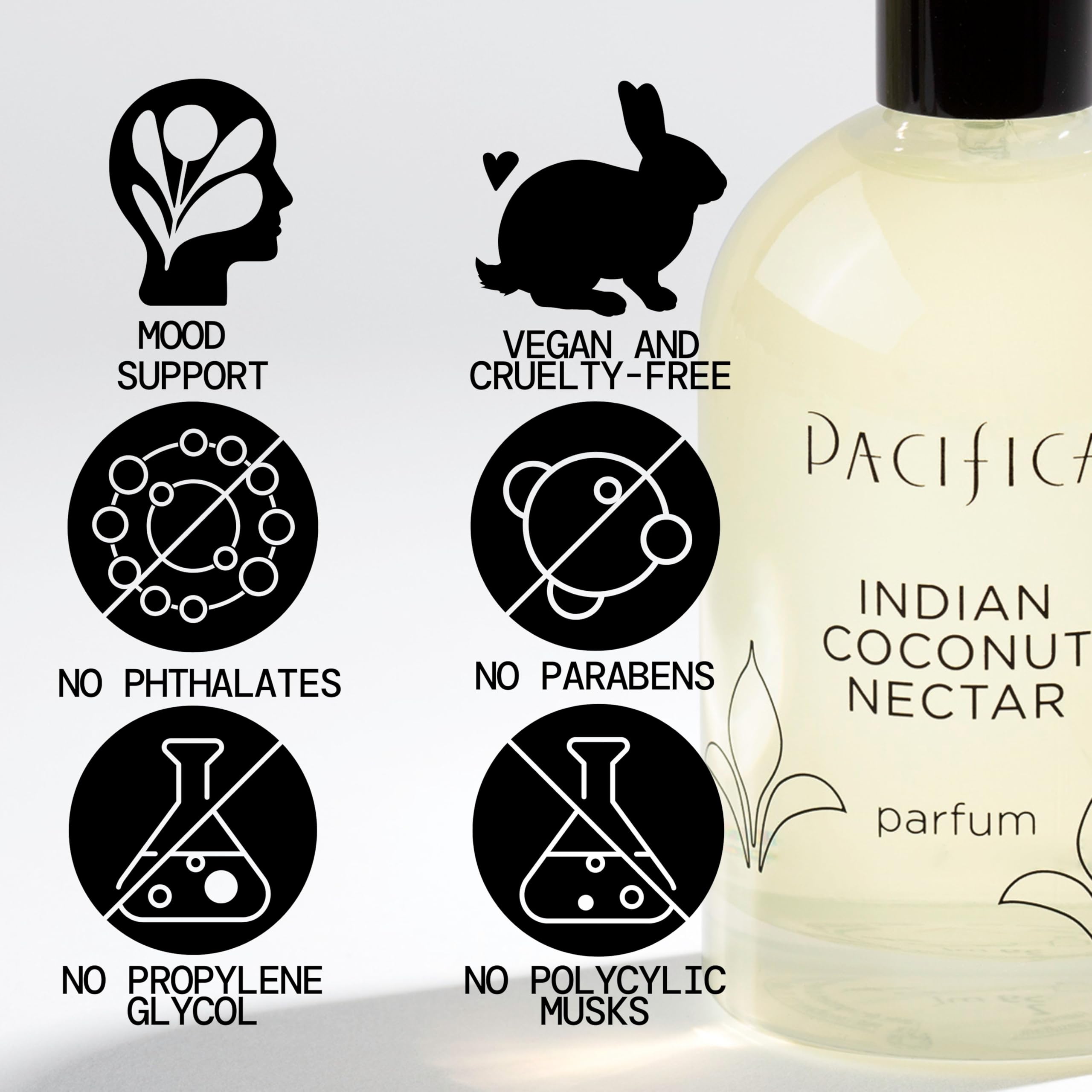 Amber hue glow on Pacifica Indian Coconut Nectar bottle for warm evening wear