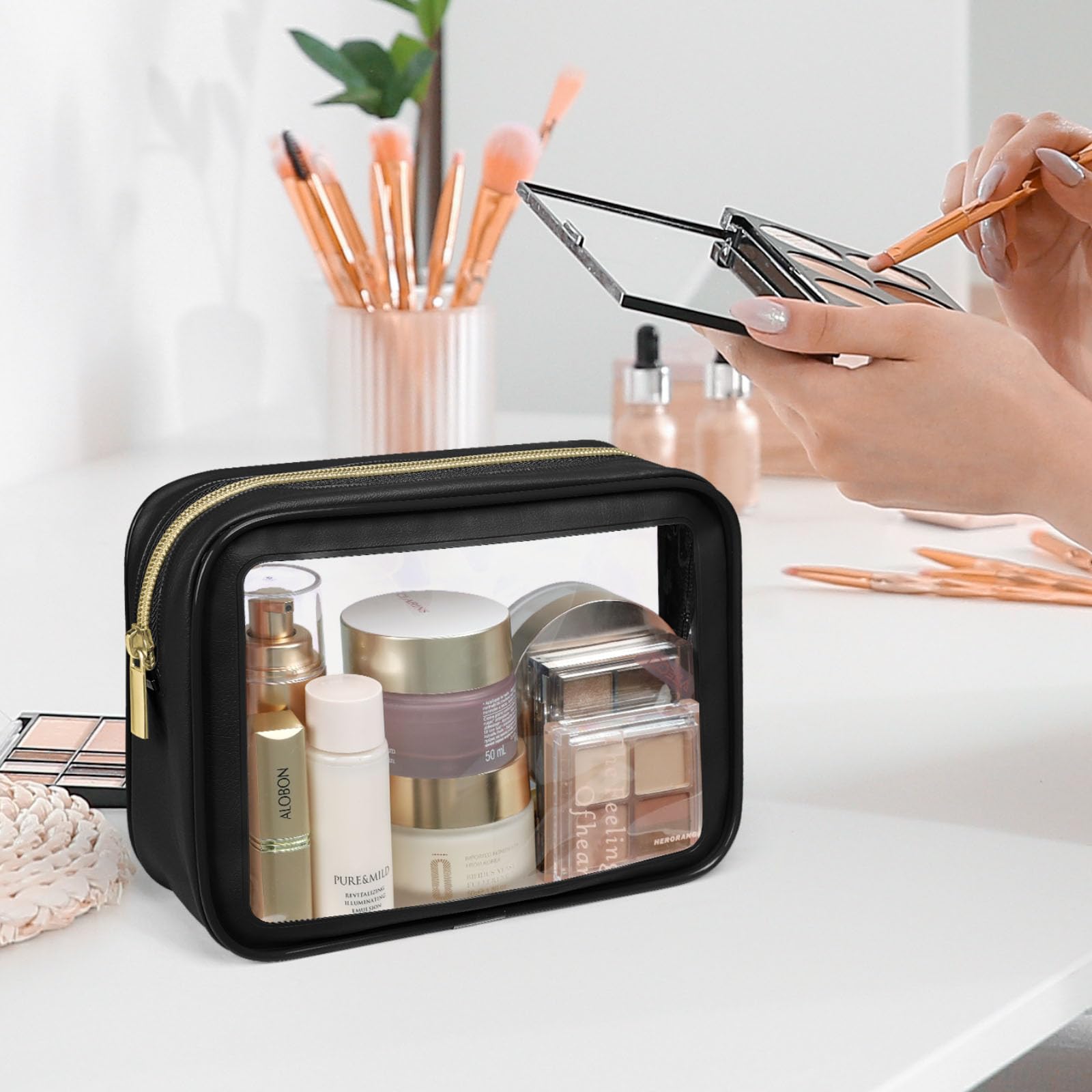 Packism clear makeup bag for outdoor travel and cosmetics storage.