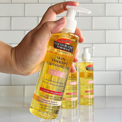 Palmer's Frasco de aceite de rosa mosqueta para nutrir la piel durante la rutina.