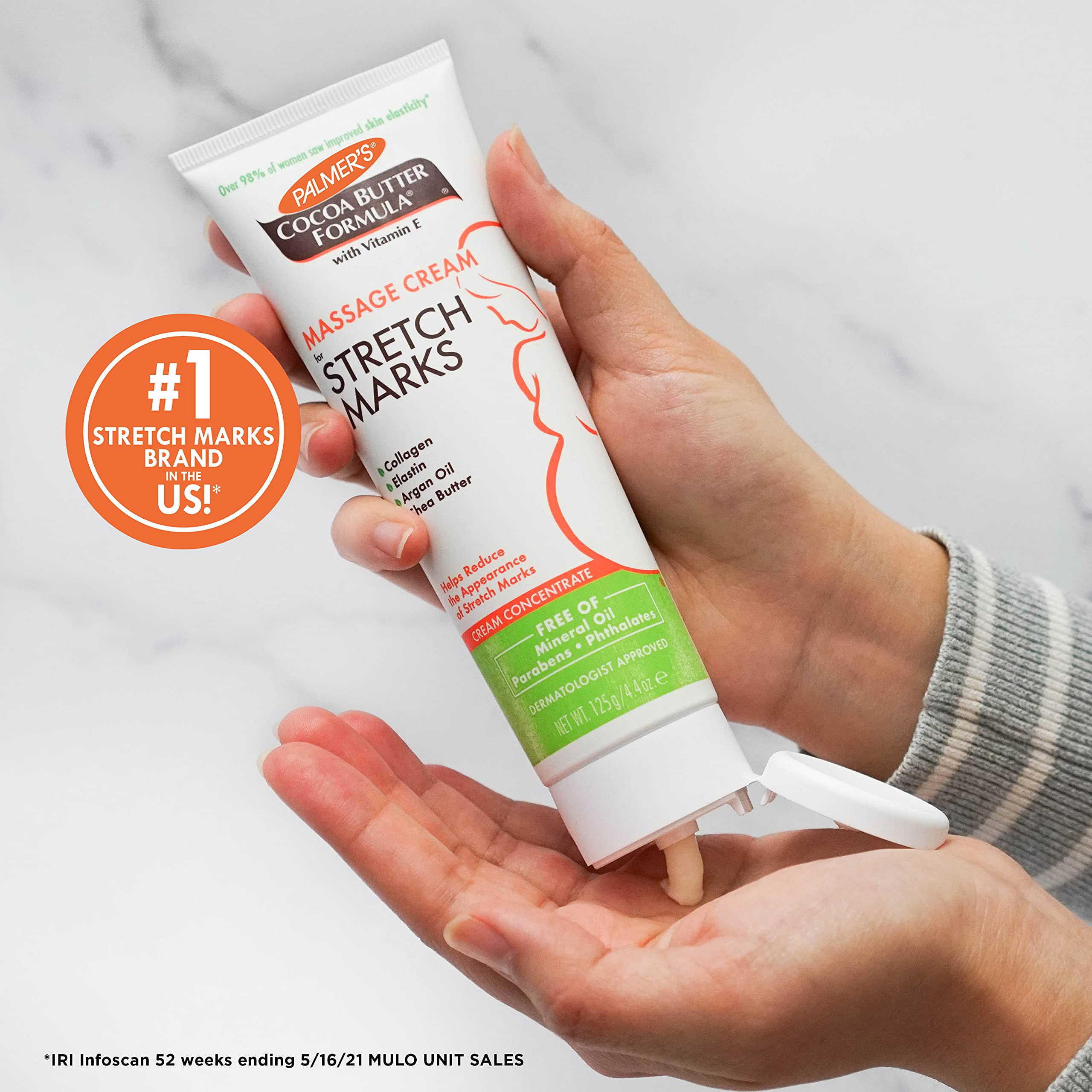 Palmer's Cocoa Butter Massage Cream in use with non-greasy finish on skin
