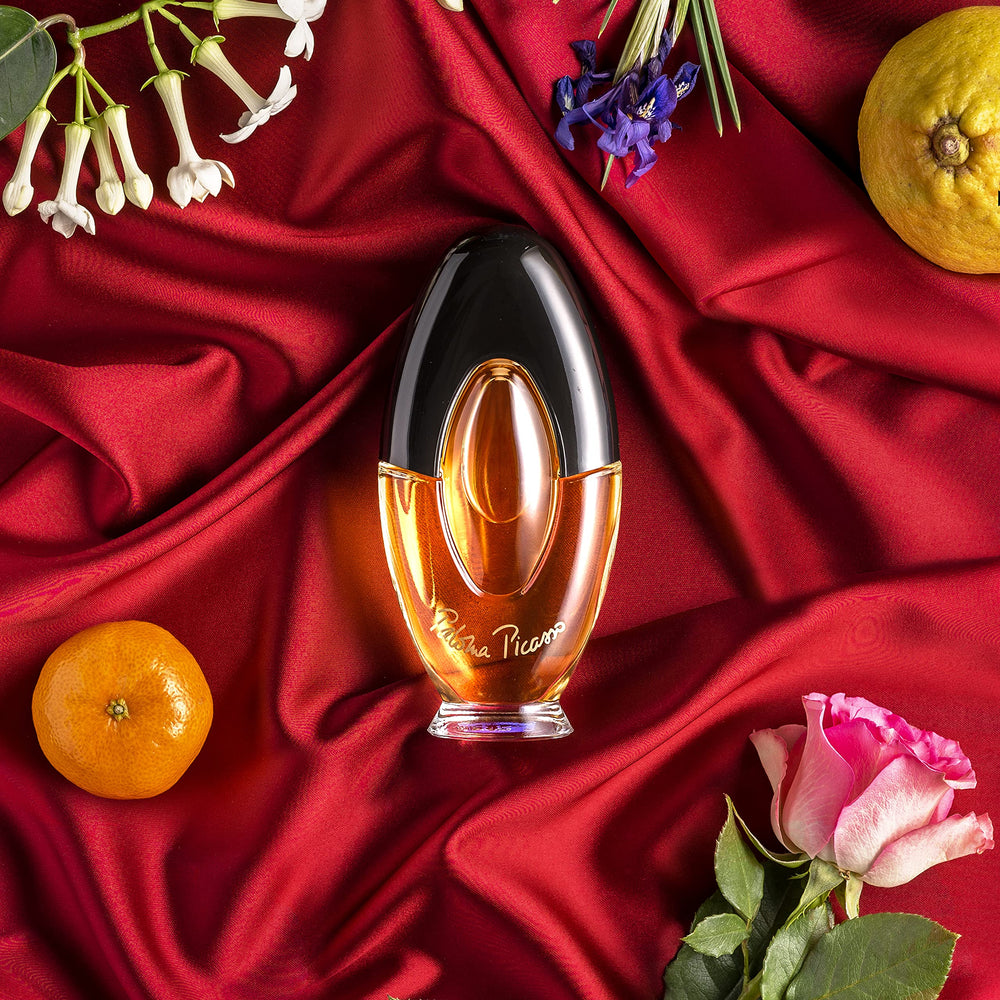 Paloma Picasso EDP bergamot-rose notes close-up, highlighting fresh citrus and florals.