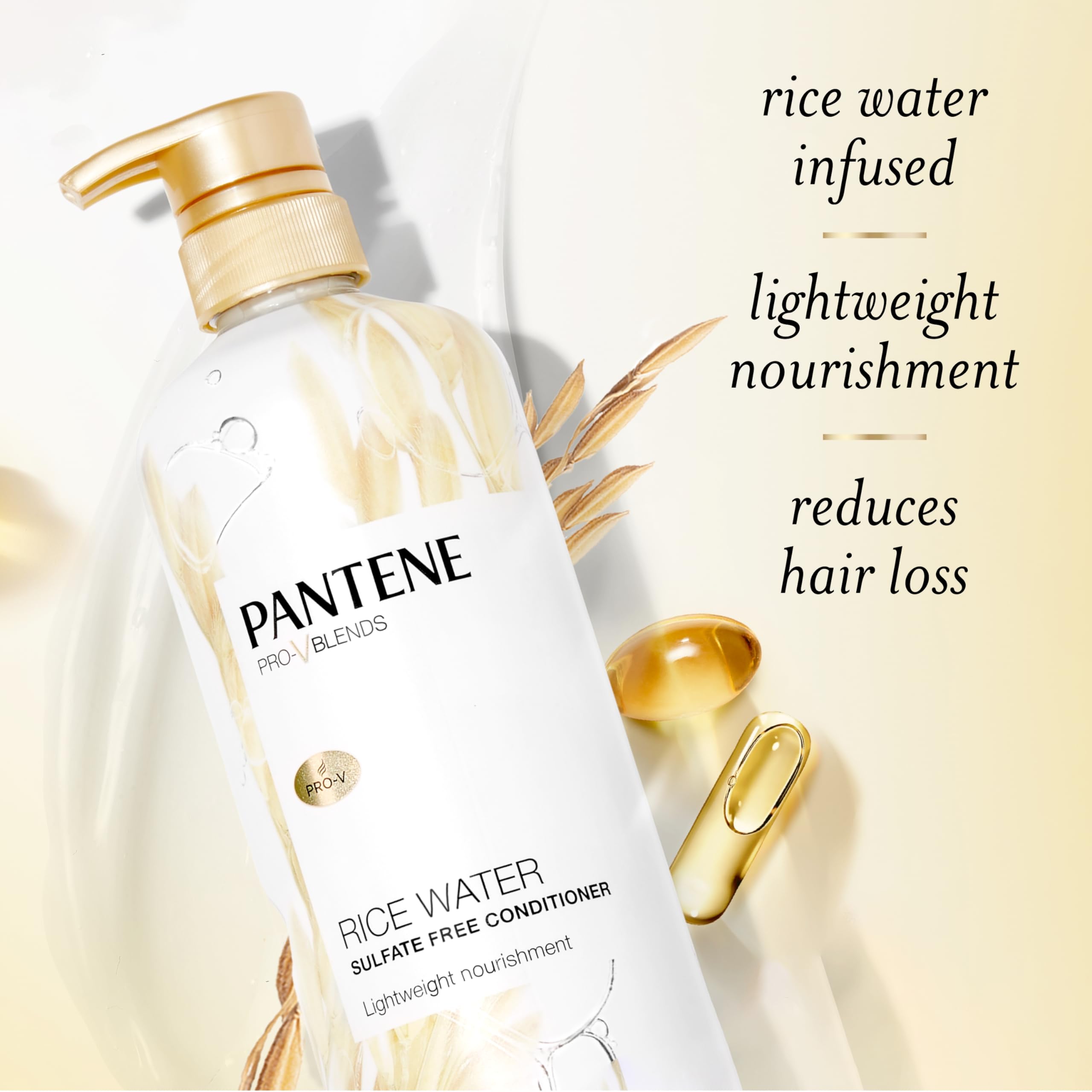 Pantene conditioner being applied to hair ends for smooth, manageable strands.