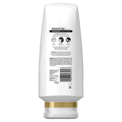 Pantene Pro-V Curly Conditioner dispensing bottle demonstrates easy, mess-free application for smooth curls