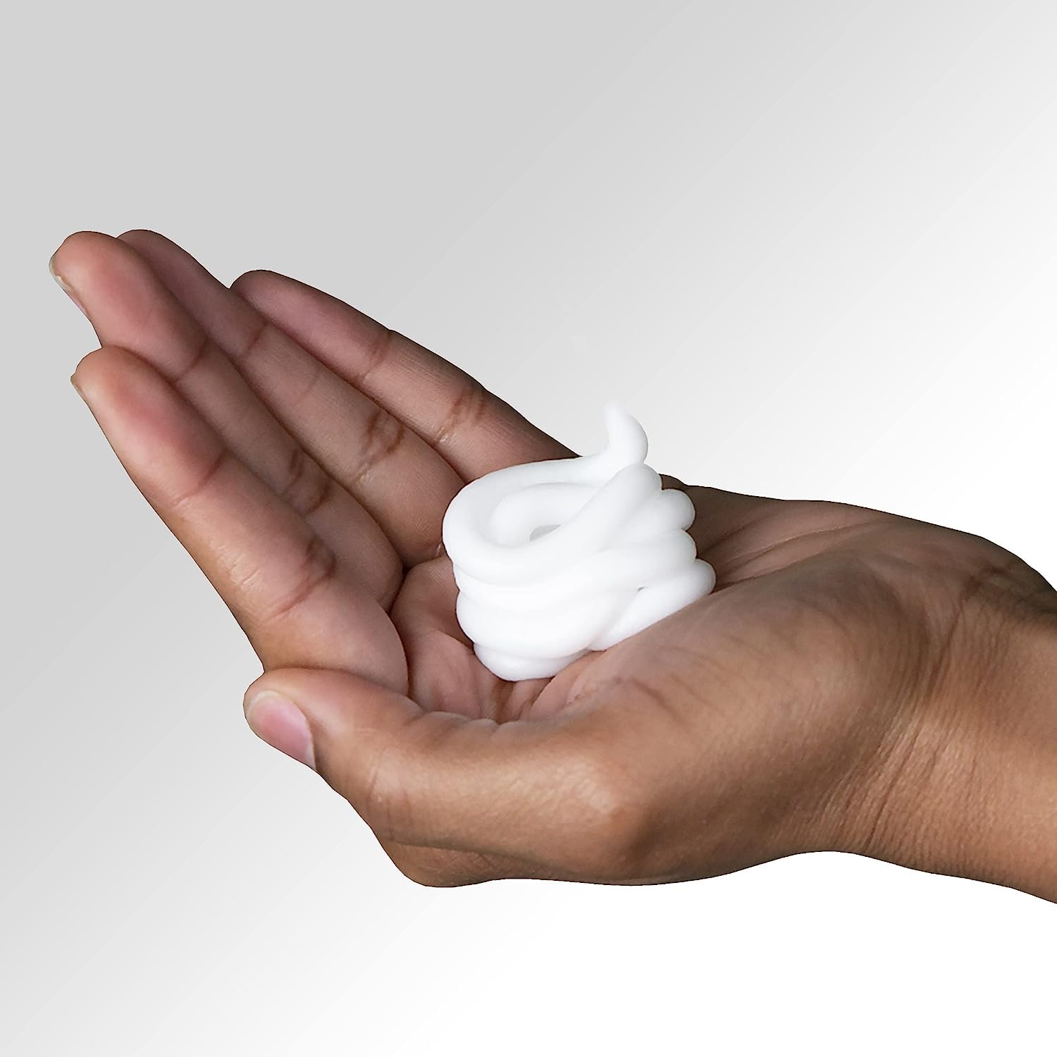 Pantene shampoo lather showing cleansing action on fine hair.