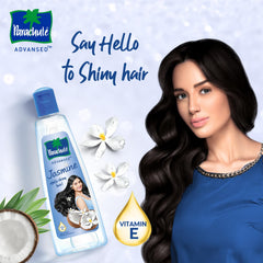 Parachute Advansed coconut oil jar closeup emphasizes rich nourishment for healthier hair.