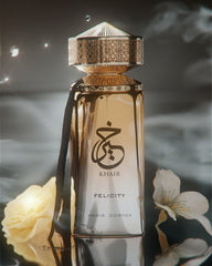 Paris Corner Khair Felicity bottle side label highlighting champagne and cassis notes