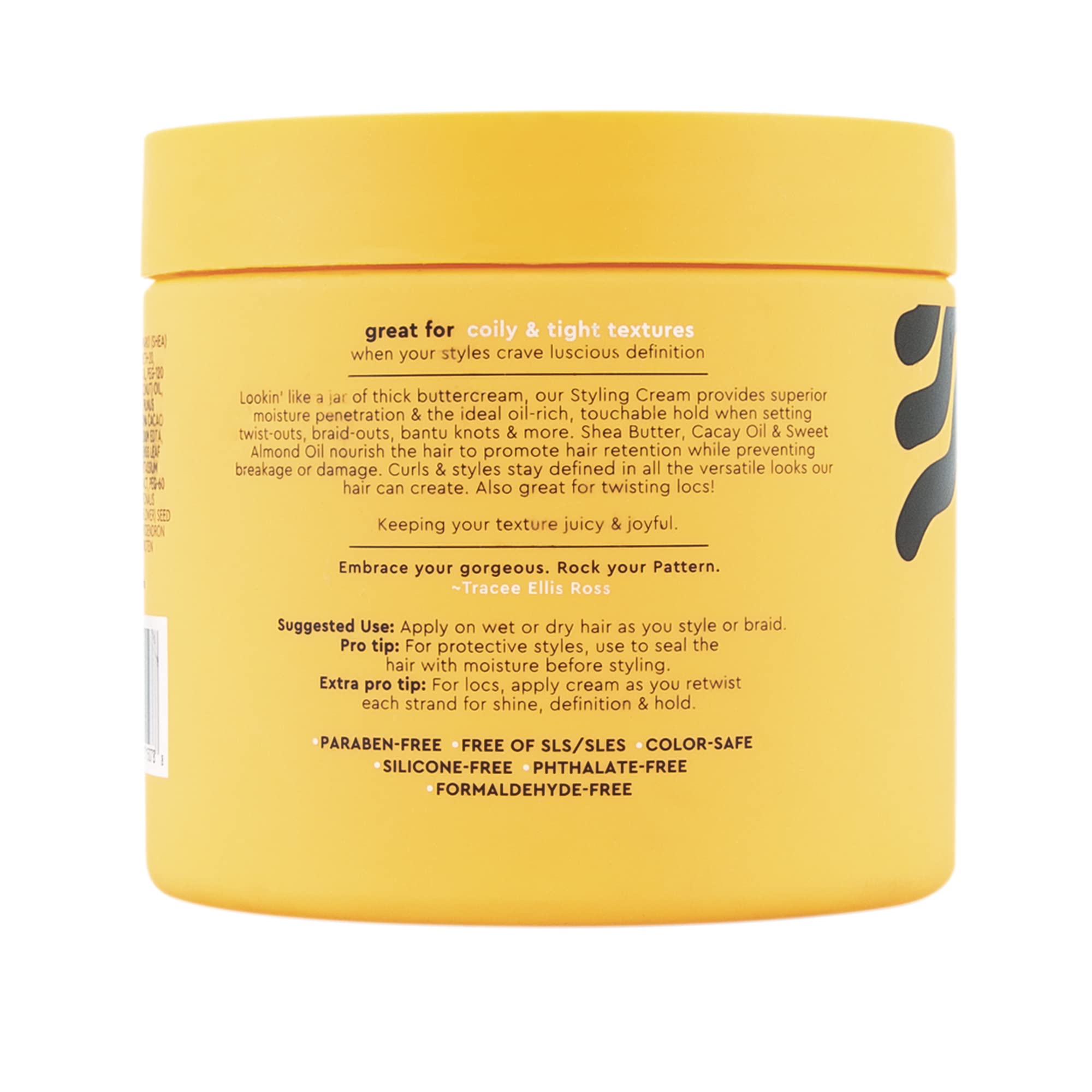 Braid-out with PATTERN Styling Cream creates defined, voluminous curls.