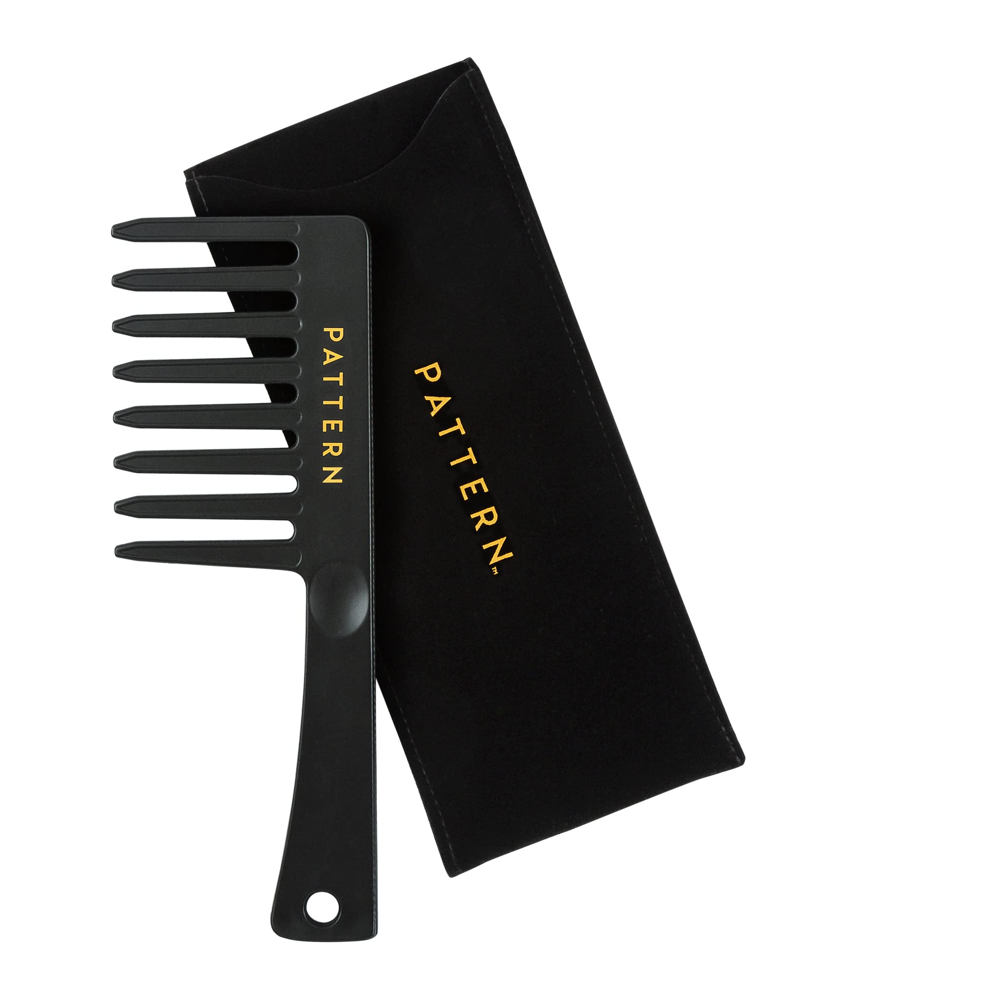PATTERN Beauty wide tooth comb used for precise sectioning of curls and coils.