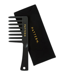 PATTERN Beauty wide tooth comb used for precise sectioning of curls and coils.