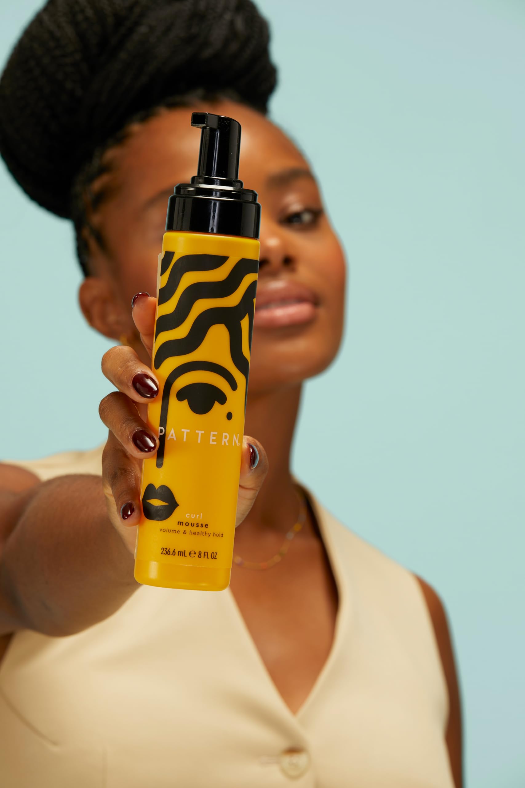 Applying PATTERN Curl Mousse distributes evenly for defined wash-and-go curls