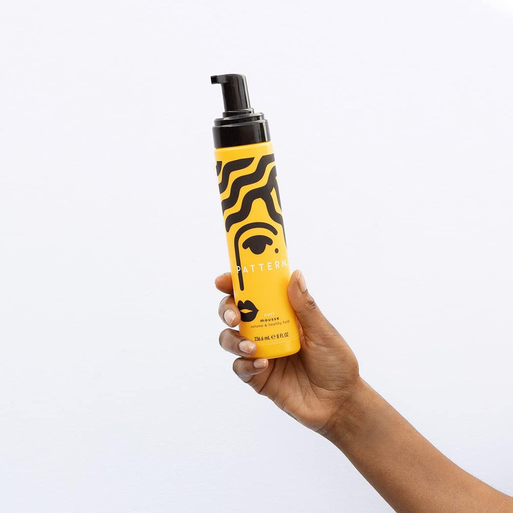 Compact PATTERN packaging for easy travel with Curl Mousse