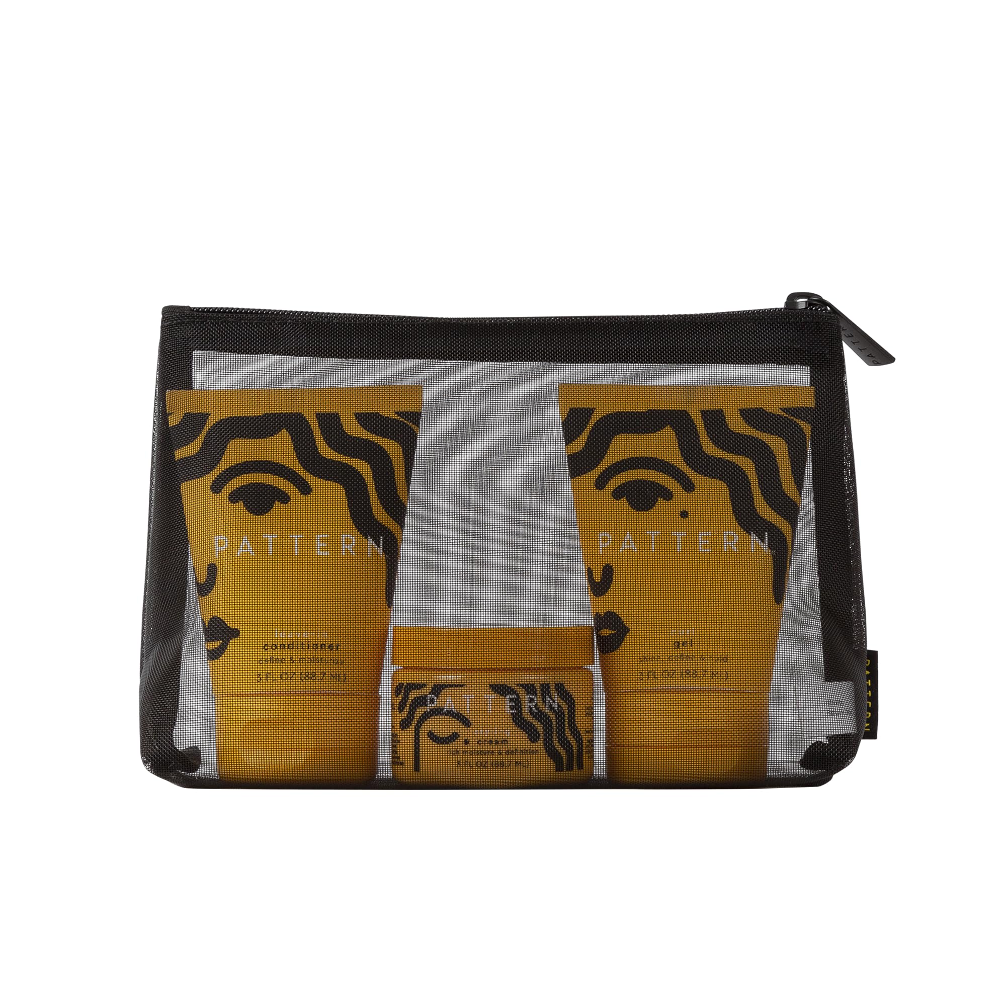 PATTERN mesh cosmetic bag keeps the Curl Cocktail Kit organized on the go.