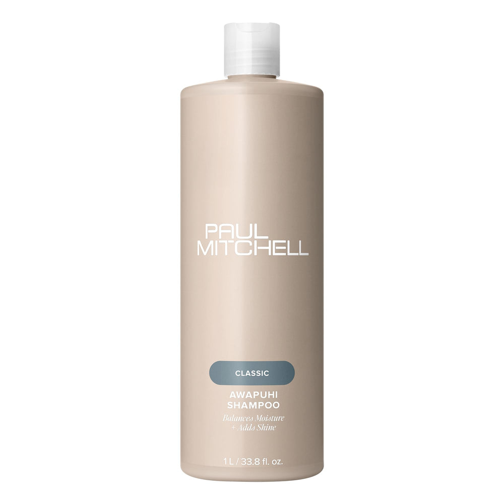 Paul Mitchell Awapuhi Shampoo bottle pouring to hydrate hair