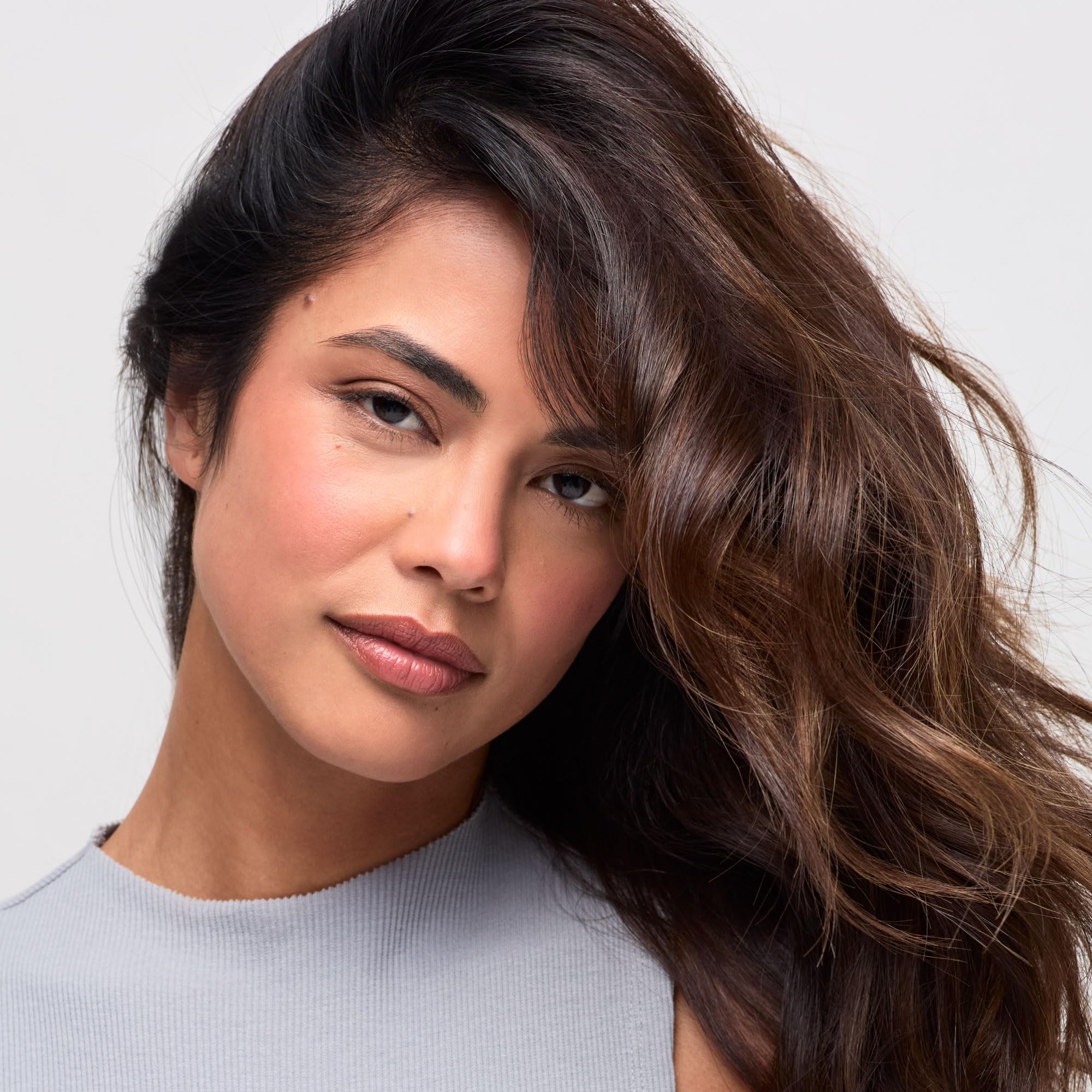 Paul Mitchell Clean Beauty Hydrate Shampoo moisture-restore shot on hair strands.