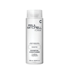 Paul Mitchell Clear Essential Condicionador sin fragancia, botella visible, cabello suave sin irritación.