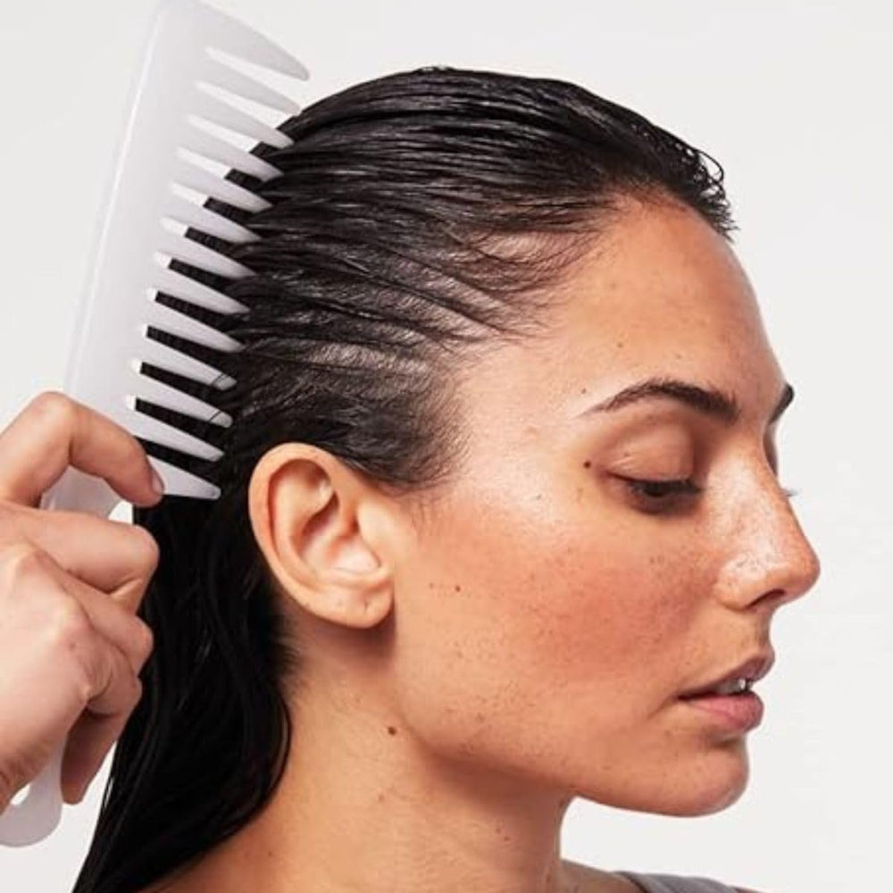 Paul Mitchell Detangler Comb distributes treatments evenly for better conditioning