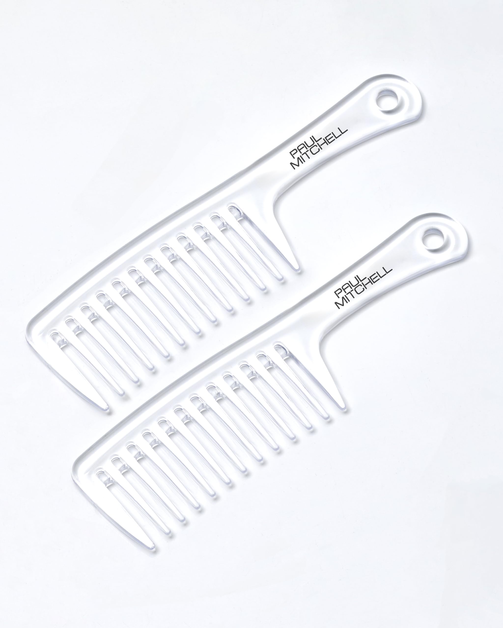 Paul Mitchell Detangler Comb on dry hair for snag-free styling.
