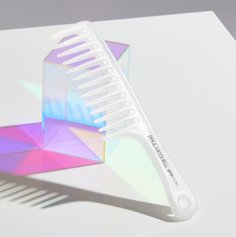 Side view of Paul Mitchell Detangler Comb showing comfortable grip