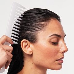 Paul Mitchell Detangler Comb used for applying hair masks evenly