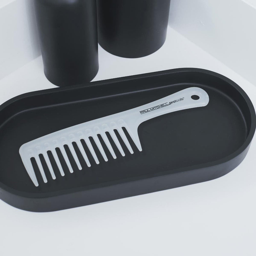 Detangler comb distributing hair masks evenly while detangling