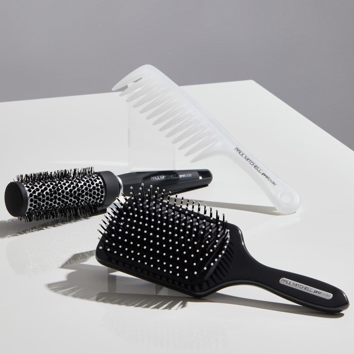 Detangler comb used to distribute leave-in conditioner evenly