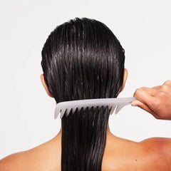Paul Mitchell Detangler Comb wide-tooth design prevents pulling during detangling