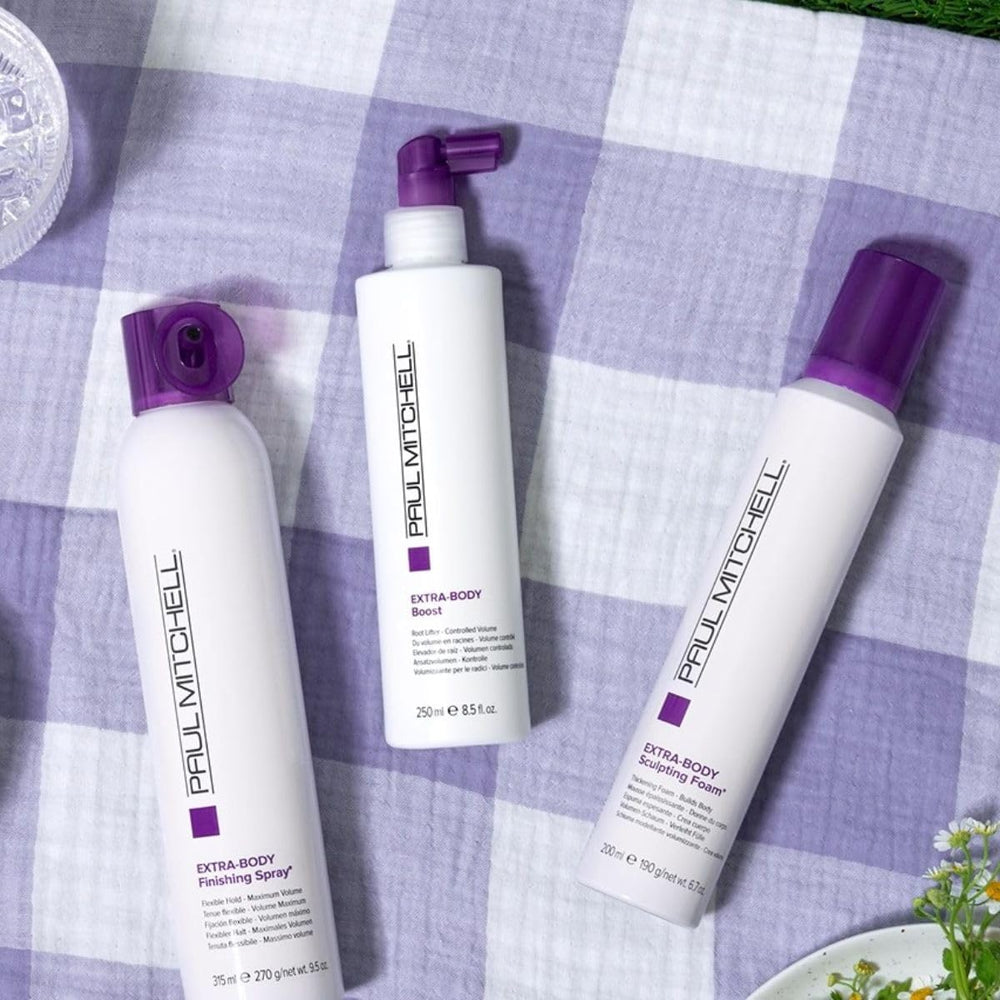 Paul Mitchell Extra-Body Finishing Spray, brillo sin residuos visibles.
